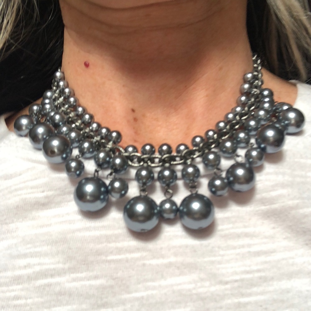 Gray pearl necklace.